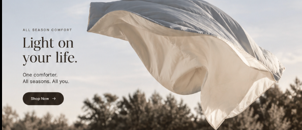 A lightweight DuoComfort comforter floating softly in the air